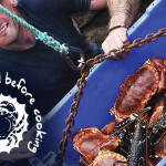 A Blue Sea Food Company handling a container of crabs and lobster