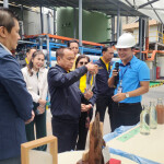 Thai Union members guide members of the Thai Ministry of Labor through one of the company's manufacturing facilities