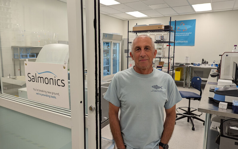 Salmonics President and CEO Cem Giray standing in the doorway of the company's laboratory