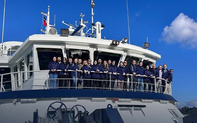 Blumar employees on board the firm's new wellboat Ronia Polaris