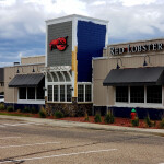 The exterior of a Red Lobster that is being repainted