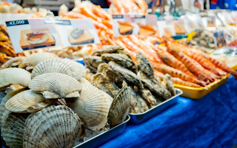 Seafood laid out at a market stand in Osaka, Japan