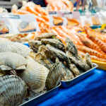 Seafood laid out at a market stand in Osaka, Japan