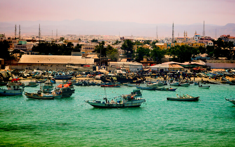 Fishing boats weaving through the busy port of Bosaso in Somalia
