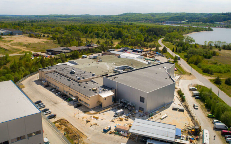 An aerial view of the exterior of a Graal Group processing facility in Poland
