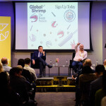 Panelists speaking on stage at the 2024 Global Shrimp Forum