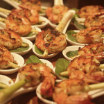 Shrimp skewers presented on soup spoons