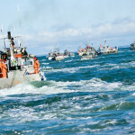 A dozen salmon-fishing boats fishing in Bristol Bay, Alaska