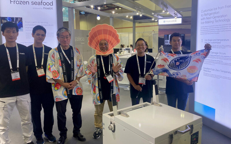 Five representatives of Frostix standing at their booth at the 2024 Seafood Expo Asia
