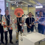 Five representatives of Frostix standing at their booth at the 2024 Seafood Expo Asia