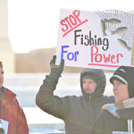 A photo of fishermen protesting in front of the U.S. Supreme Court.