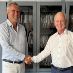 Giancarlo Badinotti and Hans Petter Selstad shake hands over a new deal