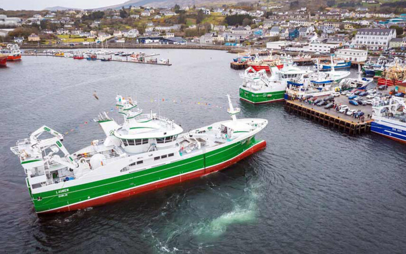 A fishing vessel pulls into the harbor in Killybegs, Ireland