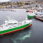 A fishing vessel pulls into the harbor in Killybegs, Ireland