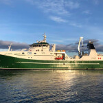 The Ocean Choice International fishing vessel Calvert floating on calm water