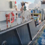 A photo of a Chinese and Filipino vessel about to collide