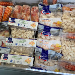 An assembly of Clearwater Seafoods packaged seafood inside a chest freezer