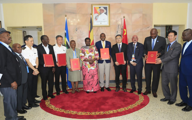 Chinese and Ugandan officials signing a protocol deal at this year’s Forum on China-Africa Cooperation in Beijing