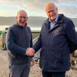 Otter Ferry Managing Director Alastair Barge and Amar Group Chair Bjørn M. Apeland shaking hands at Otter Ferry Seafish in Scotland