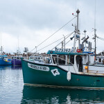 Fishing boats in a harbor in Quebec, Canada