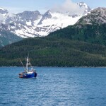 A fishing vessel sails in Prince William Sound