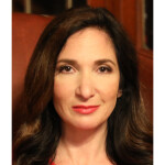 A headshot of macro-economist, geopolitical finance expert, and best-selling author Nomi Prins