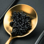 Umami Bioworks' cultivated caviar on a spoon