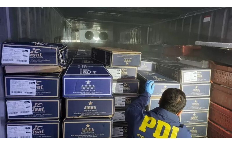 Chilean police with confiscated salmon