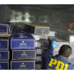 Chilean police with confiscated salmon