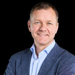 A headshot of David Kennerley