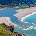 The Klamath River in California emptying into the Pacific Ocean