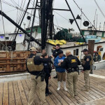 Fishers being detained by the U.S. Coast Guard