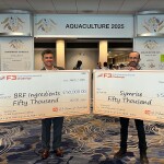 Representatives of BRF Ingredients and Symrise hold their prize checks