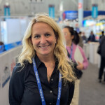 Pine Island Redfish CEO and Co-founder Megan Sorby in an aisle at Seafood Expo North America