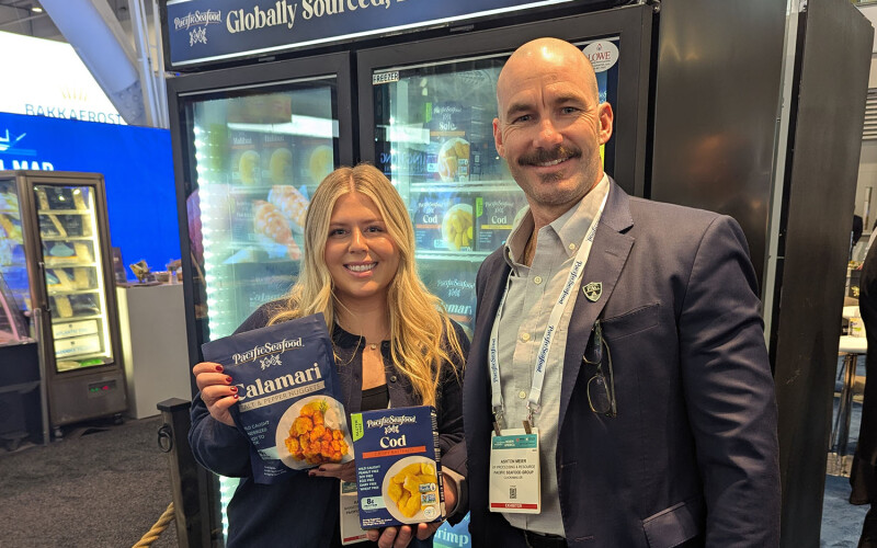 Pacific Seafood Marketing Brand Manager Kady Freeze and Vice President of Resource Sales and Processing Ashton Meier showing off the company's new branding