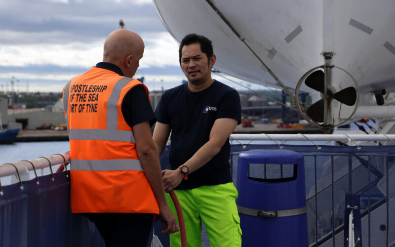 A Stella Maris representative meeting with a fisher at the Port of Tyne, U.K.