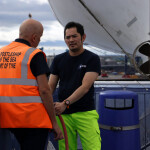 A Stella Maris representative meeting with a fisher at the Port of Tyne, U.K.