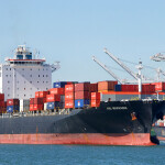 A shipping vessel loaded with containers