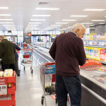 Shoppers inside the U.K. look at items on shelves