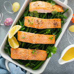 A salmon dish with Easter eggs surrounding it