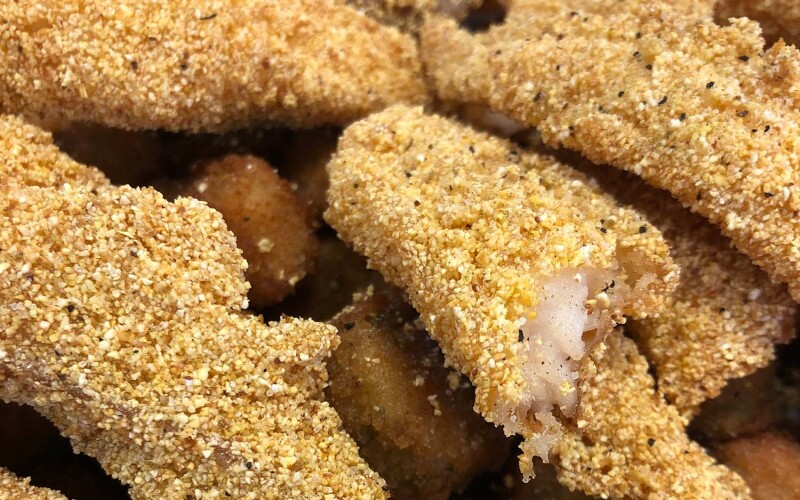 A pile of breaded catfish strips