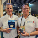 Abrolhos employees at Seafood Expo Global showing off their product packaging