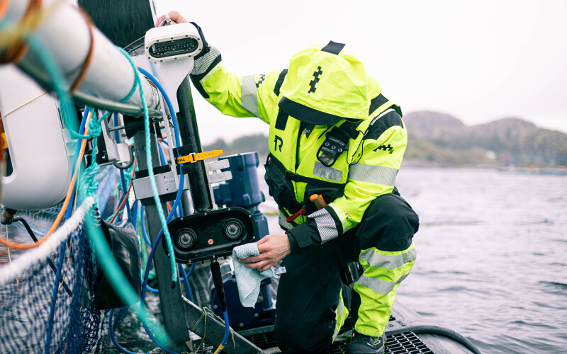 A Tidal employee holding one of the company's camera systems