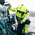 A Tidal employee holding one of the company's camera systems