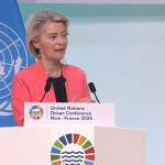 European Commission President Ursula von der Leyen at a podium
