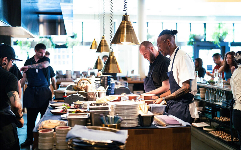 Chefs at Kann in Portland, Oregon, U.S.A., hard at work in the kitchen