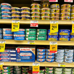 Canned tuna on a grocery store shelf