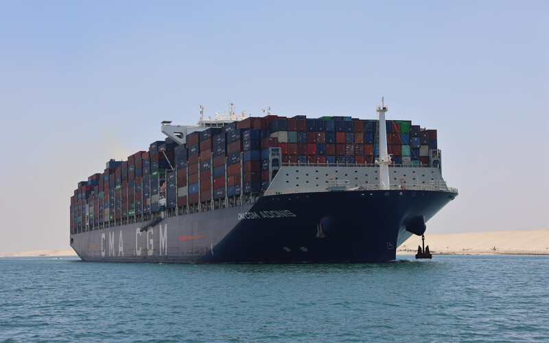 A CMA CGM shipping vessel transiting the Suez Canal