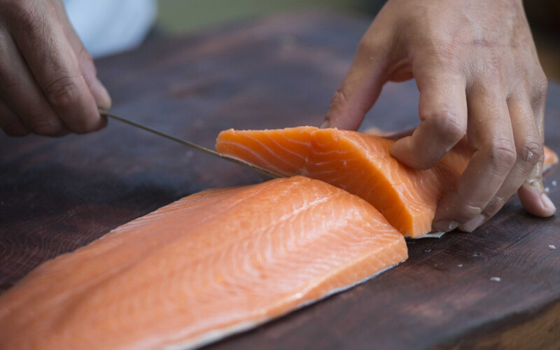 Cutting a salmon fillet