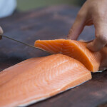 Cutting a salmon fillet